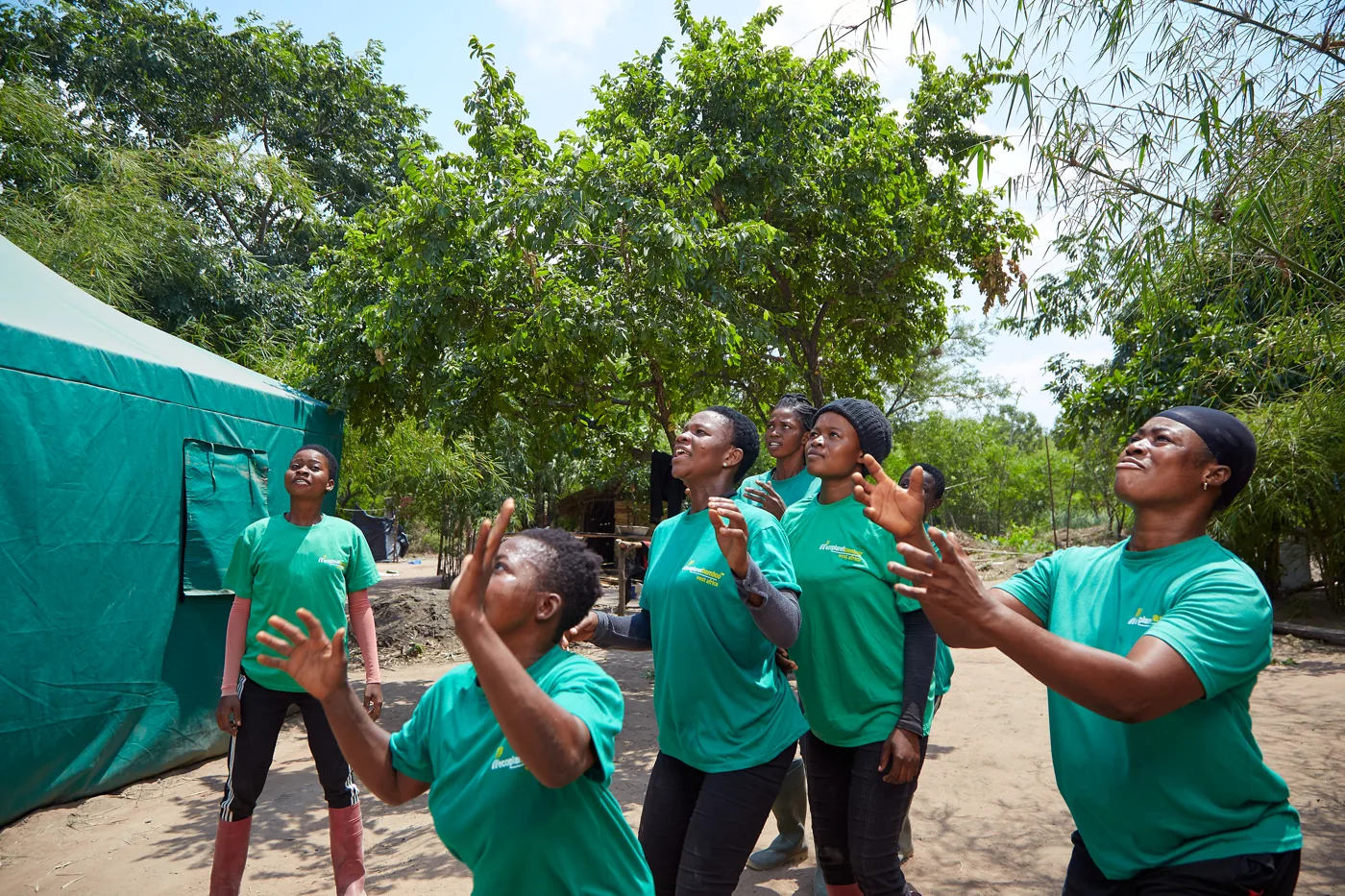 Ghana field team laughing together at camp